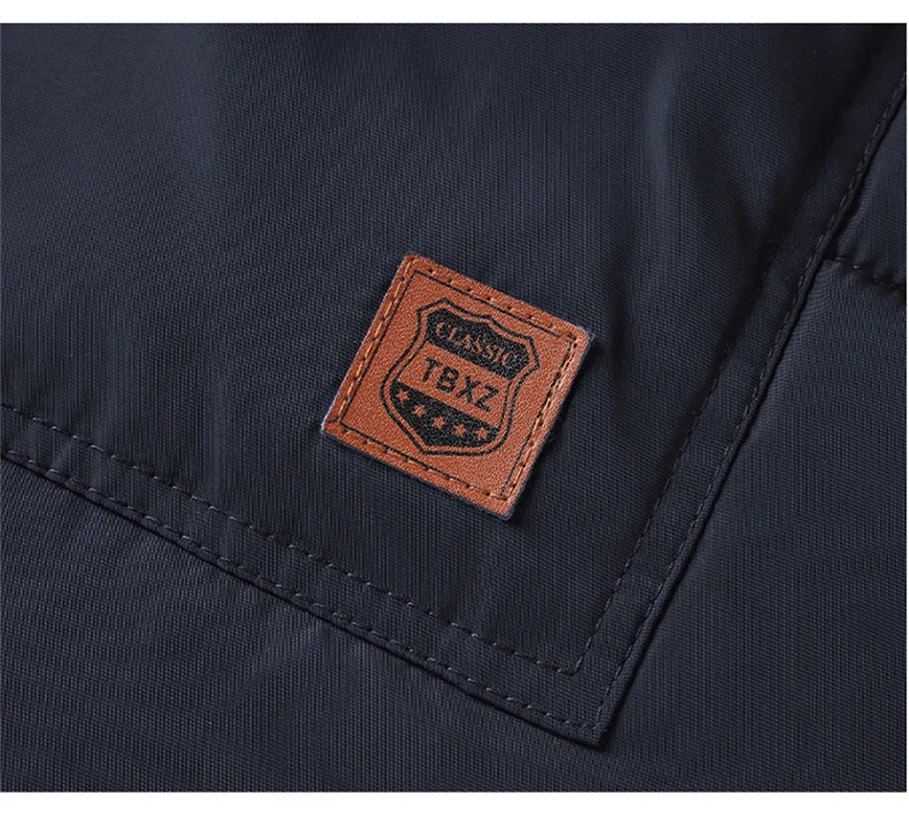 The new men's winter workwear for 2025 features a thick and warm windproof wool men's fur coat with a hood and a leather collar